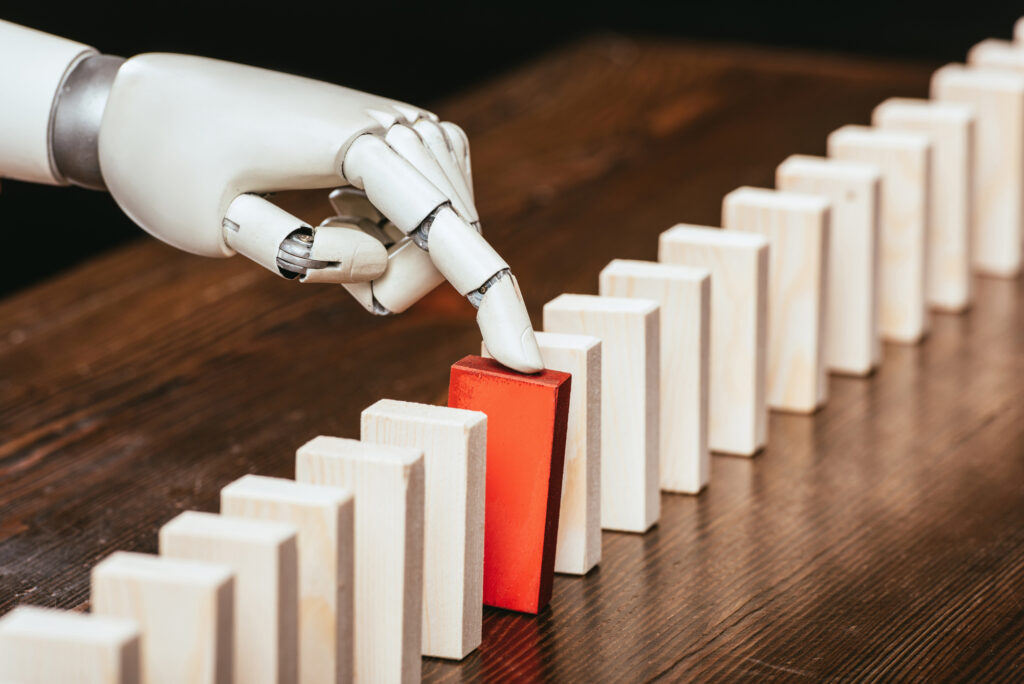 A robotic hand holding a block